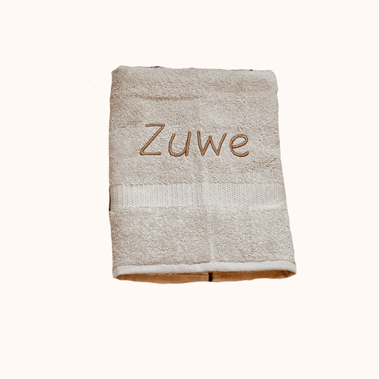 Handdoek 100x50cm met naam - crème